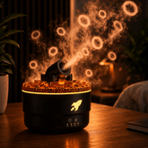 Volcanic smoke ring diffuser emitting hypnotizing smoke rings with unique crackle light effect.